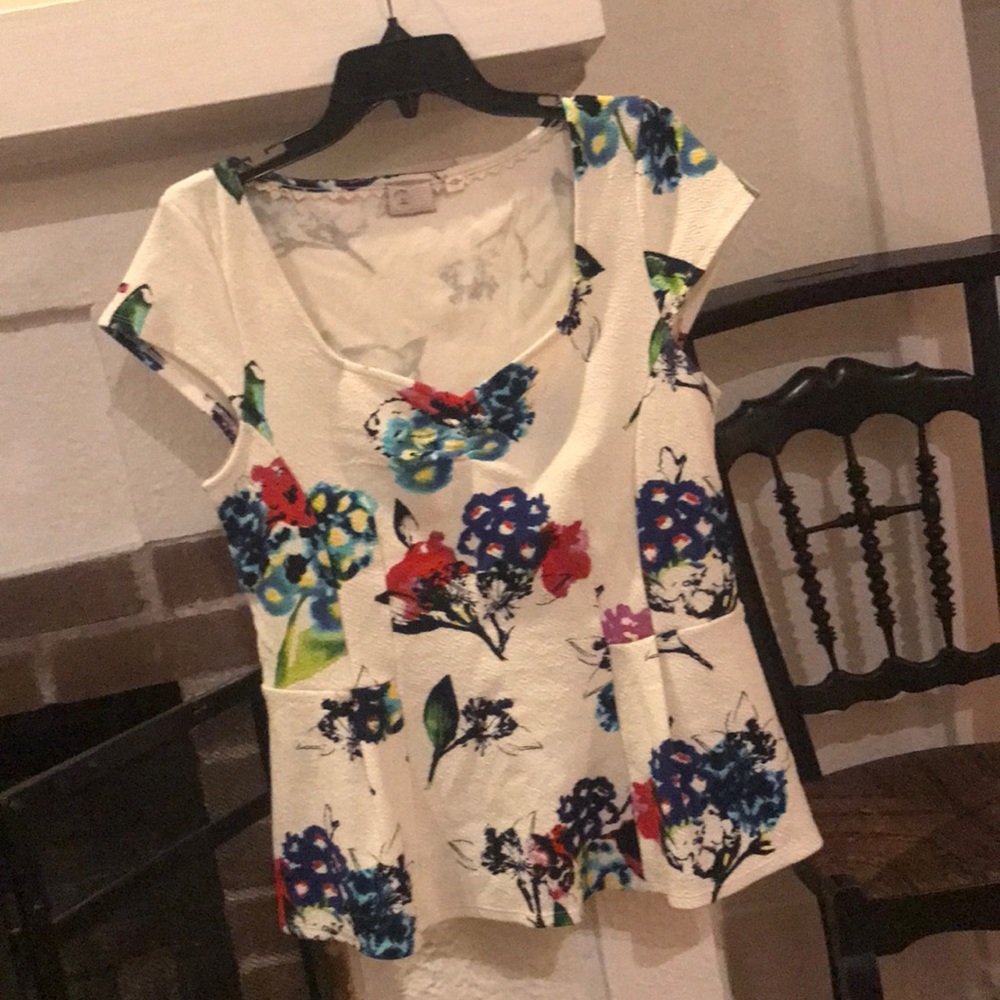 Anthropologie brand peplum top